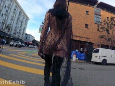 ShyGothExhib crosses the street naked but for lace cape gif
