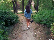 Luna Roulette gives quick panty flash as you follow her in the park gif
