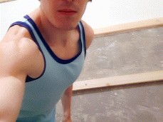 man with perfect body pissing in white shorts gif