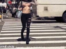 public exhibitionist topless on busy street gif