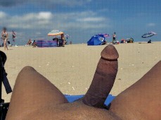 angeleyeddemon shows off his big, throbbing cock on a public beach 0007-2 3 gif
