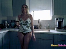 Nikki Brooks sipping  and considering her options in her panties gif