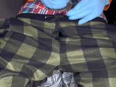 Jerking His Clothed Boner with Rubber Gloves gif