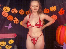 Jessie st Claire putting on Halloween lingerie gif
