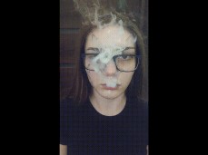SLUT WITH GLASSES SMOKE AFTER BLOWJOB! gif