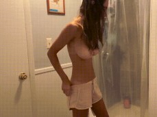Cam catches Stormi undress before a shower gif