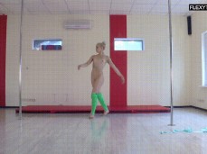 Blonde in green high socks kicks high the air from several angles in gym gif