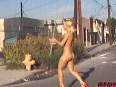 Nude Goldie Coxx In Red Heels Walking Across The Street And Clapping gif