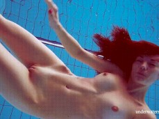 Tall nude woman diving in the pool gif