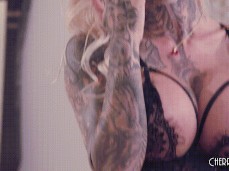 Busty Tattooed Blonde Chantal Danielle Strips and Slides A Dildo into her T gif
