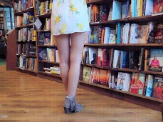 Exhibitionist wife flashing pussy in library & stares at camera gif