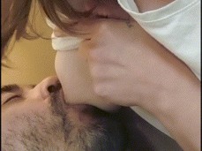 man loves sucking her tits gif