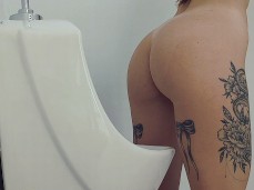 Peeing with beautiful tattooed thighs 6 gif