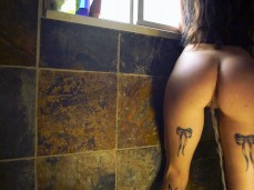 Peeing with beautiful tattooed thighs 9 gif