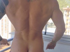 bald  muscle stud shows off his ass, back muscles, biceps 0108-1 gif