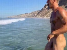 Lean muscle hunk Julian Jaxxxon shows off his big cock in the surf 0036-1 7 gif
