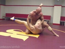 bald-headed wrestler hits on rival's beefy ass 0309 gif