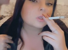 cumshot facial while casual smoking on the bed gif