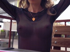 Exhib showing her beautiful tits in sheer top in public gif