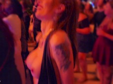 flashing tits at club, showing hard nipples gif
