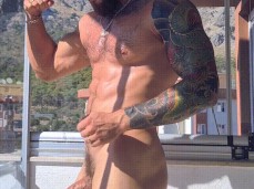 muscle stud shows off his hot body on the balcony 0443-1  flexing gif