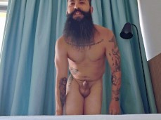 beefy, smooth, bearded Spaniard shows big fat hard uncut cock 0124-1 gif