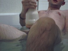 James Denton uses his fleshlight in the bath gif