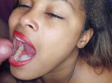 pretty red lips get cum in mouth gif