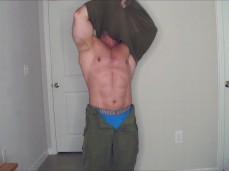 bodybuilder Tony Dinozzo takes his shirt off for roommate 0443-1 gif