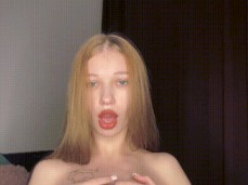 Beauty blonde plays with nipples and jerks off her pussy gif
