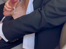 CUmming all over himself in a suit gif