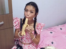 Cute petite lady teasing you with a banana gif