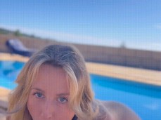 Pretty blond blows by the pool gif