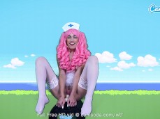 Sexy nurse Delilah Day sits in her cam show on sybian gif