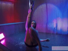 Hot babe moves sexy to club music beside pole showing her hairy pubic pussy gif