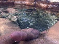 beefy guy sits in a pond, playing w/ his hot cock an hungry hole 0358-1 10 gif