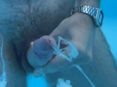 hairy guy jerks off in the swimming pool, cums a lot under water 0246-1 10 gif