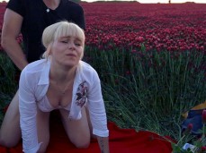 Cheap blonde  gets  in flower field gif