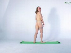 Nude woman stretching on a yoga mat gif