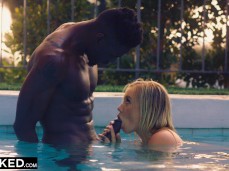 Bailey Brooke sucking Black guy's cock in pool gif