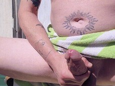 Burly dude sits outdoors, stroking his thick hot precum-oozing cock 0019-1 gif