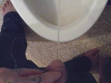 Peeing into the toilet gif