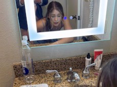 Standing doggy in a dress in front of a mirror gif