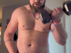Buff, bearded, hung MilkTheBull trains his biceps until he cums hands free gif