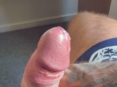 Squeezing his big, fat balls makes Koby's thick uncut dick explode 0344-1 gif