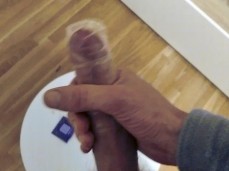 Rolling on and playing with a magnum condom on my big cock gif