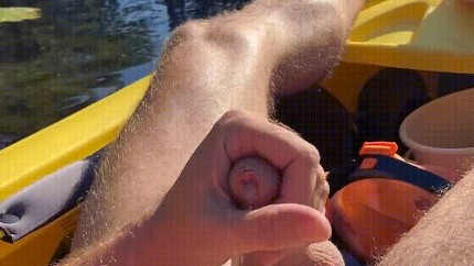 AaronTheKayaker strokes his big uncut cock in a boat, and cums 0102-1 10