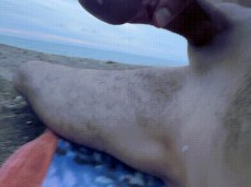 Even on a cloudy day, this hairy, hung Italian has a good time on the beach gif