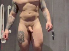 Sexy, bald, inked British muscle jock shows off his hot body and uncut cock gif