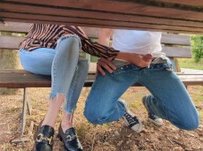 girl gives handjob under table gif